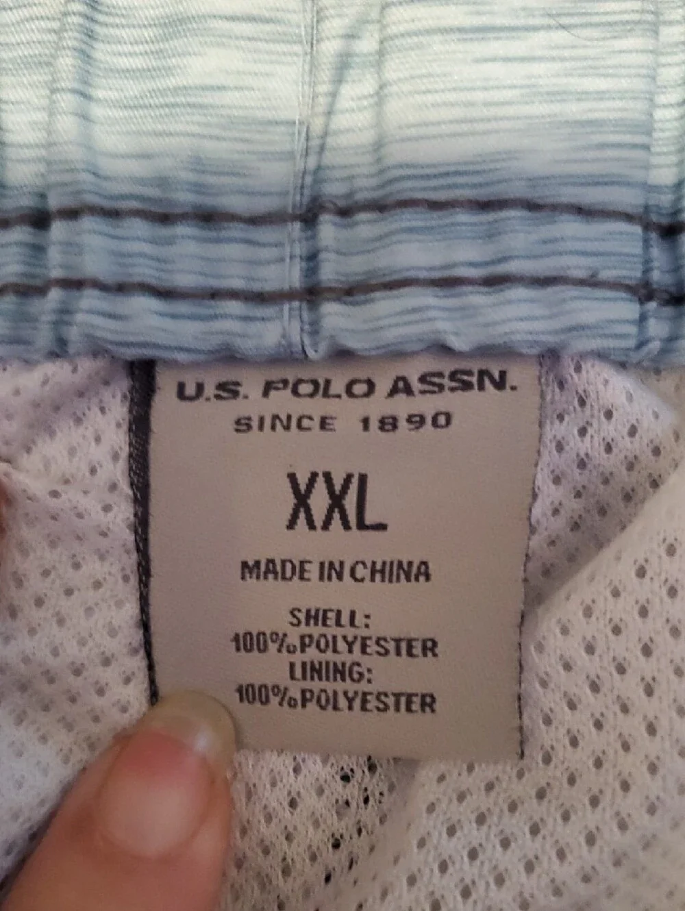 U.S. Polo Assn. Men’s Three-Tone Navy, Gray, and Light Blue Swim Trunks